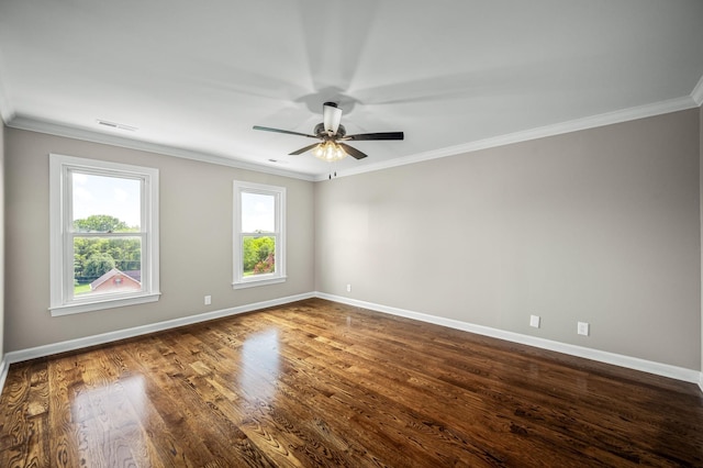 spare room with hardwood / wood-style floors, ceiling fan, and ornamental molding