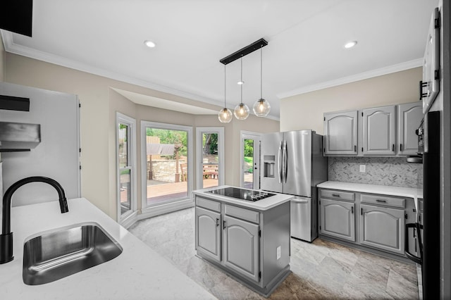 kitchen with gray cabinetry, sink, black electric cooktop, and stainless steel refrigerator with ice dispenser