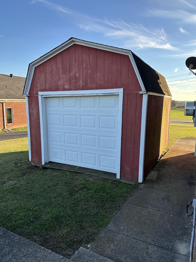 garage with a yard