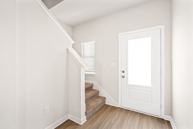 entrance foyer featuring light wood-type flooring