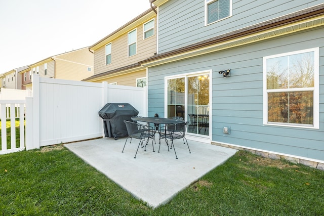 view of patio featuring a grill