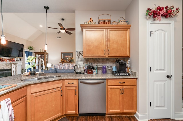 kitchen featuring dark hardwood / wood-style flooring, ceiling fan, sink, dishwasher, and hanging light fixtures