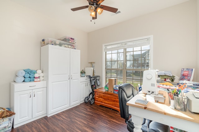 office with ceiling fan and dark wood-type flooring