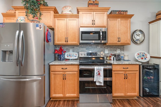 kitchen featuring backsplash, dark wood-type flooring, wine cooler, light stone countertops, and stainless steel appliances