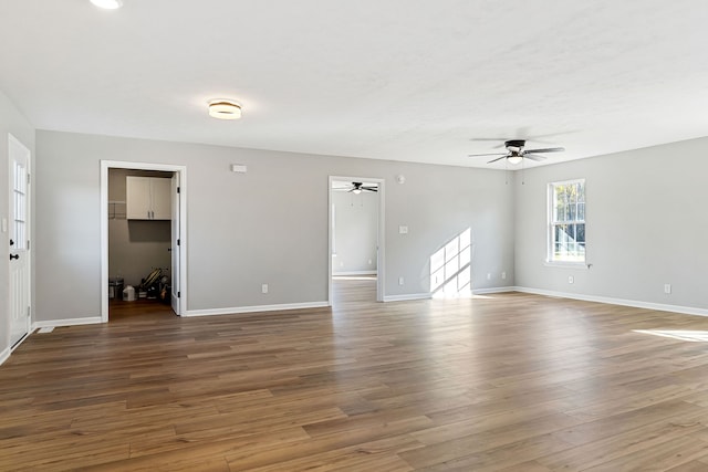 spare room featuring ceiling fan and hardwood / wood-style floors