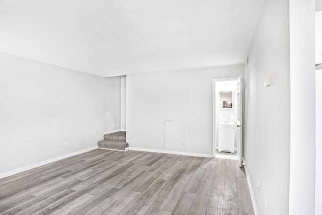 unfurnished room featuring light hardwood / wood-style floors