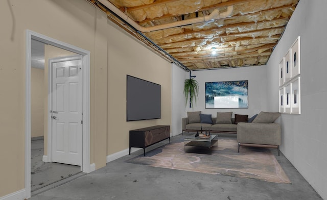 living room featuring concrete floors