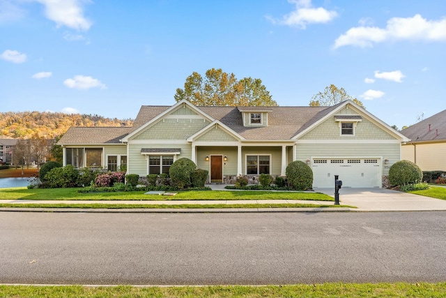 craftsman-style home with a garage and a front lawn