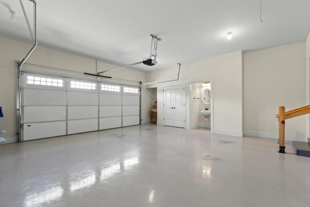 garage featuring a garage door opener