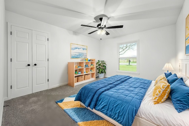 bedroom featuring ceiling fan, a closet, and carpet floors