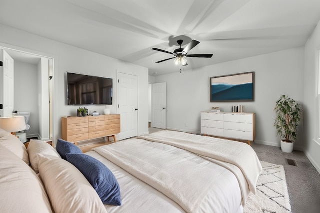 bedroom with a ceiling fan, light colored carpet, visible vents, and baseboards