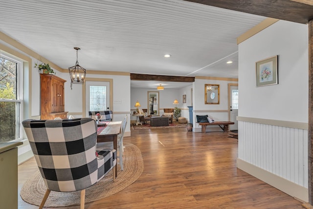 dining room featuring a chandelier and light wood-type flooring