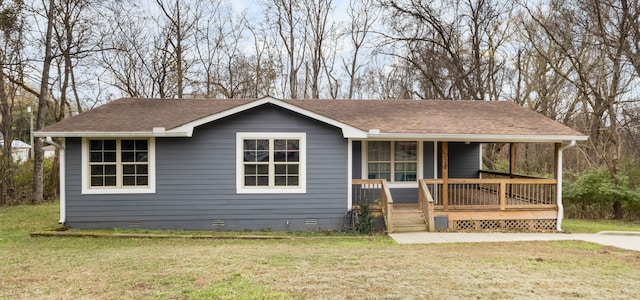 ranch-style home with a front yard and a porch