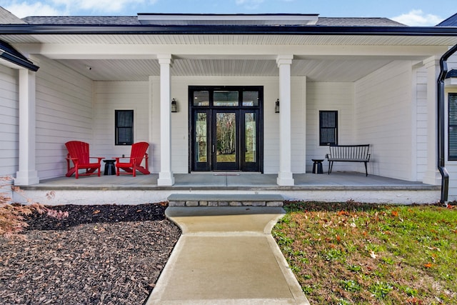 doorway to property with covered porch