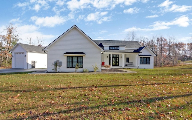 modern inspired farmhouse featuring a front lawn