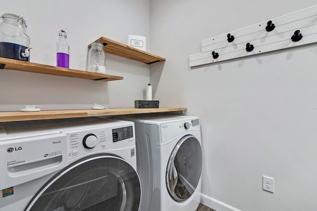 washroom with washer and clothes dryer