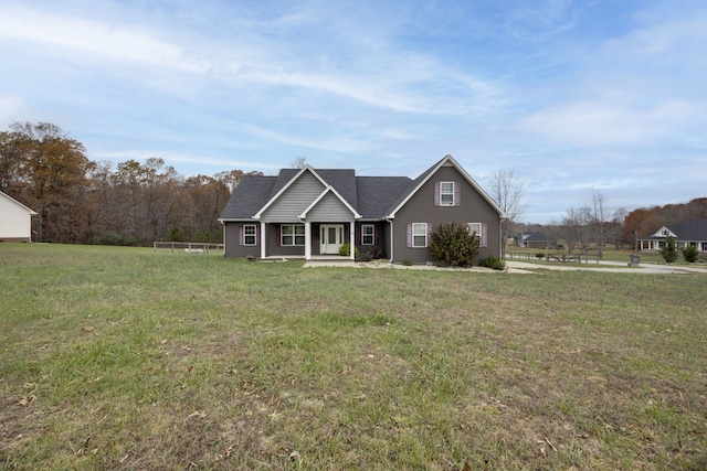 view of front of property with a front lawn