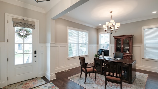 home office with ornamental molding, an inviting chandelier, and dark wood-type flooring