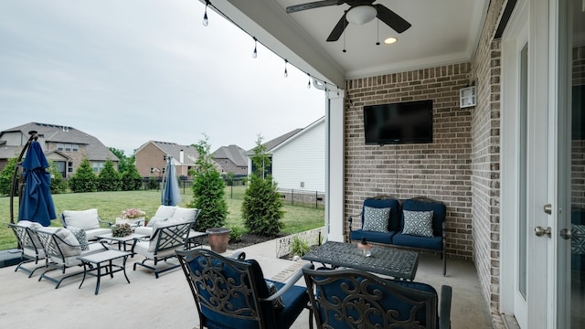 view of patio / terrace featuring an outdoor living space and ceiling fan