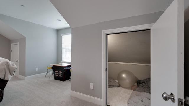 carpeted bedroom with vaulted ceiling