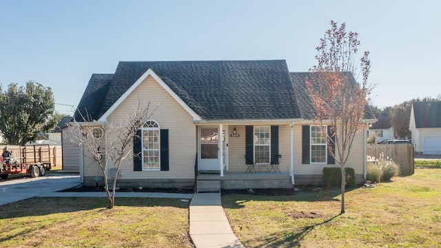 bungalow-style house featuring a porch and a front lawn