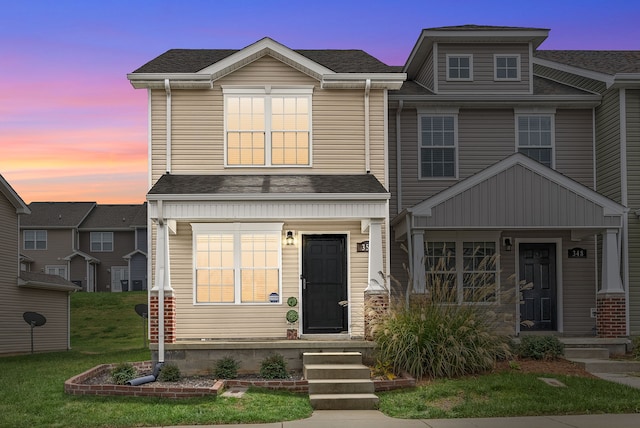 view of front of house featuring a yard