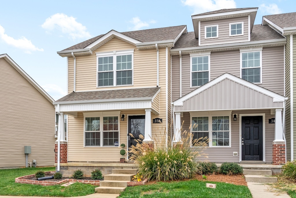 craftsman-style home with covered porch