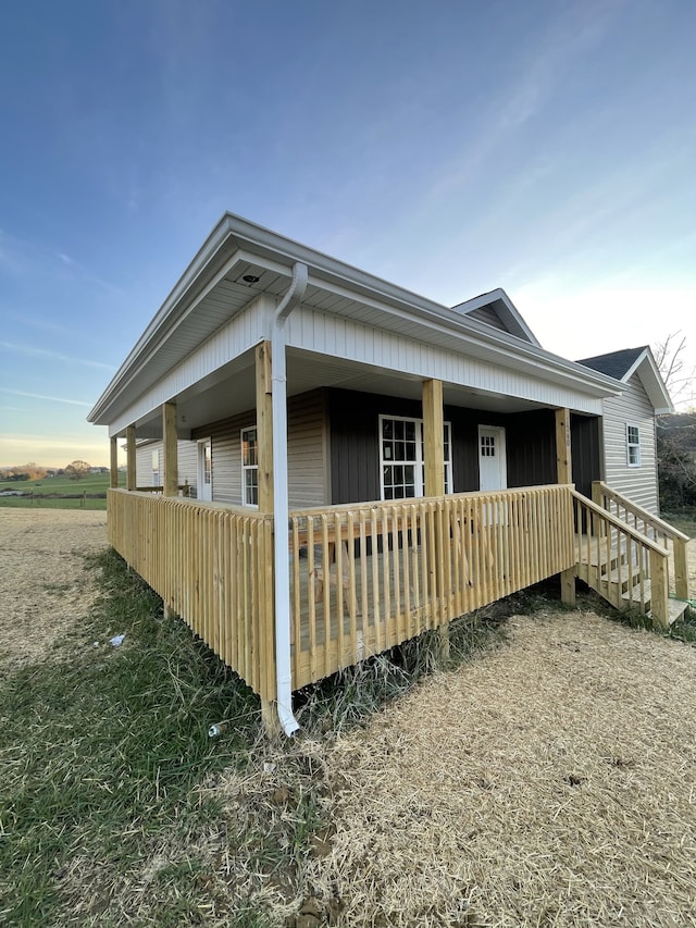 view of home's exterior with a porch