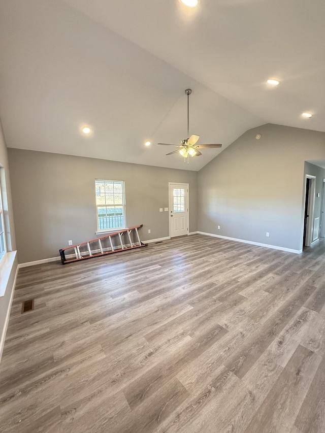 1260 Hutchins Rd, Mc Minnville, TN 37110 - unfurnished living room with lofted ceiling, light hardwood / wood-style flooring, and ceiling fan