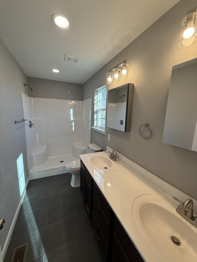 1260 Hutchins Rd, Mc Minnville, TN 37110 - bathroom featuring vanity, toilet, and a shower
