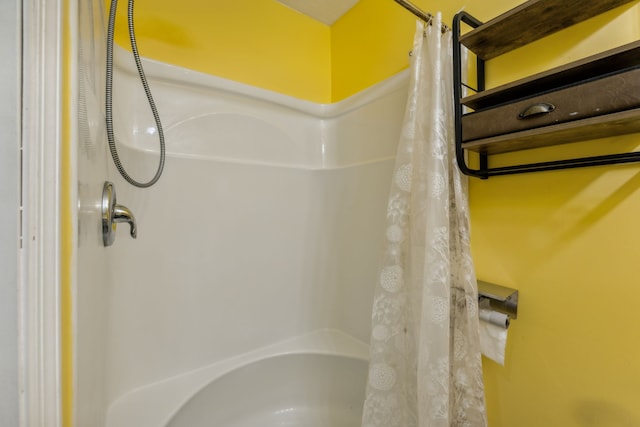 bathroom featuring shower / bath combination with curtain