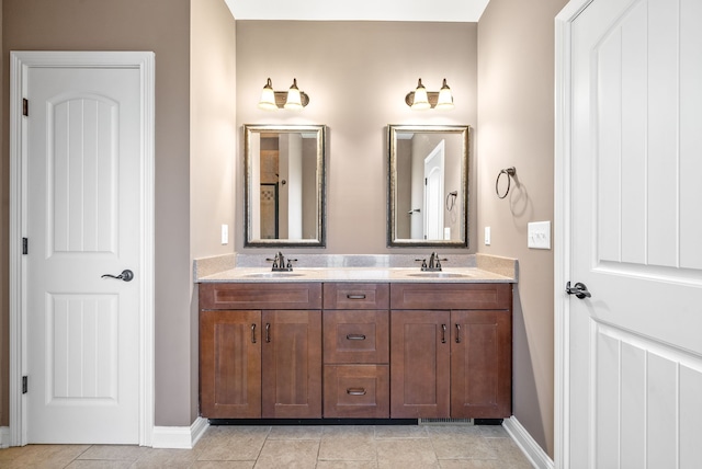 bathroom featuring tile patterned floors and vanity