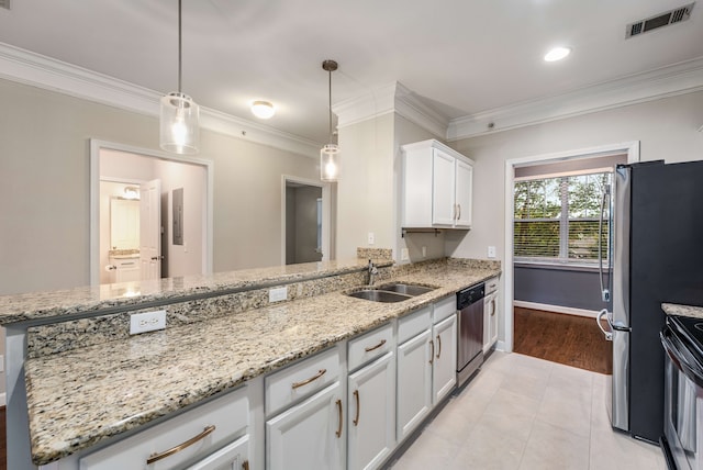 kitchen with white cabinetry, sink, stainless steel appliances, crown molding, and decorative light fixtures