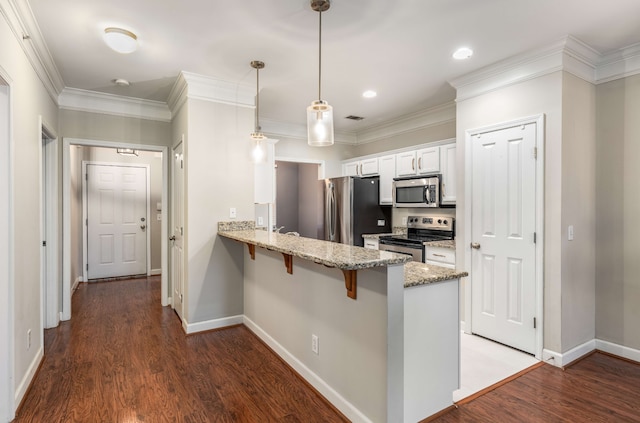 kitchen with white cabinetry, stainless steel appliances, dark hardwood / wood-style flooring, kitchen peninsula, and pendant lighting