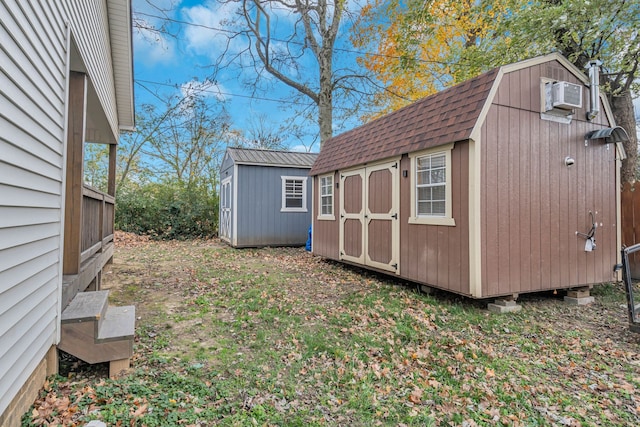 view of outbuilding featuring cooling unit