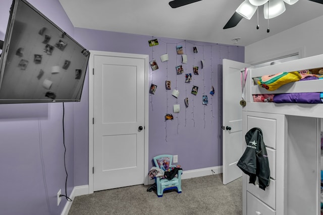 bedroom featuring ceiling fan and light colored carpet