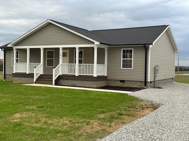 view of front of home with covered porch and a front yard