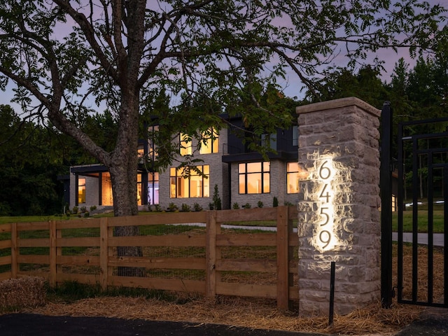 view of gate at dusk