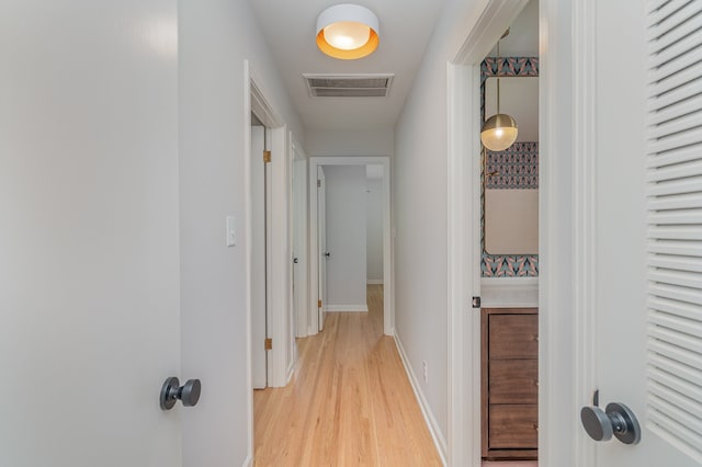 hallway featuring light hardwood / wood-style flooring