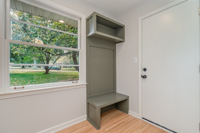 mudroom with light hardwood / wood-style floors