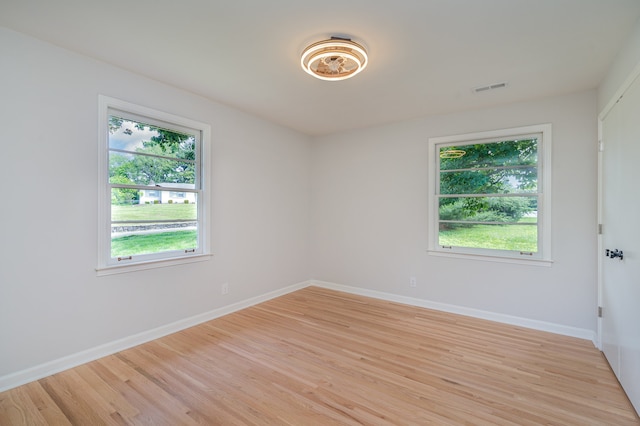 empty room featuring light wood-type flooring