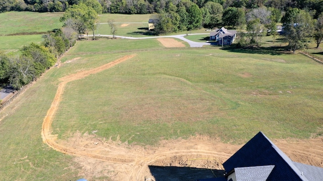 birds eye view of property featuring a rural view