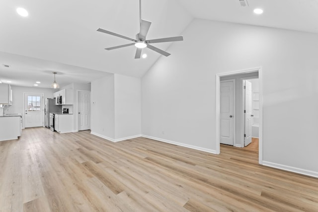 unfurnished living room with ceiling fan, high vaulted ceiling, recessed lighting, baseboards, and light wood-type flooring