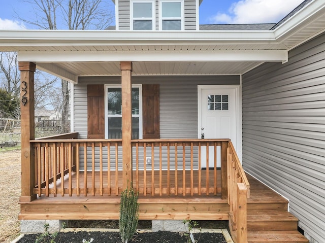 property entrance featuring a porch