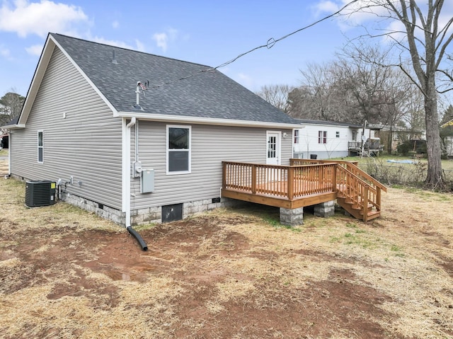 back of house featuring a deck, crawl space, roof with shingles, and central AC