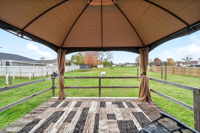 view of patio / terrace with a gazebo and a trampoline