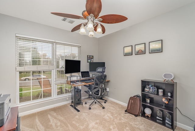 office area with light carpet and ceiling fan