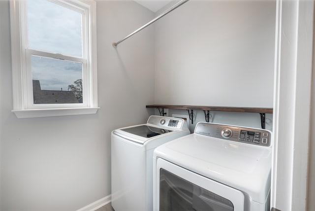 laundry area featuring washing machine and dryer