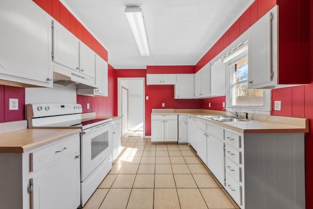 kitchen featuring white cabinets, light tile patterned floors, white appliances, and sink