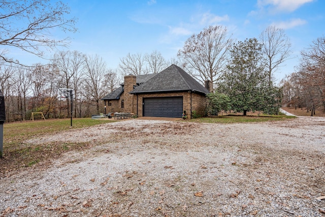 view of property exterior featuring a garage